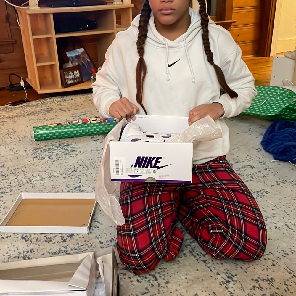 Size 7 1/2 women’s Nike Jordan 1’s. Purple and white. Bought for $304.
